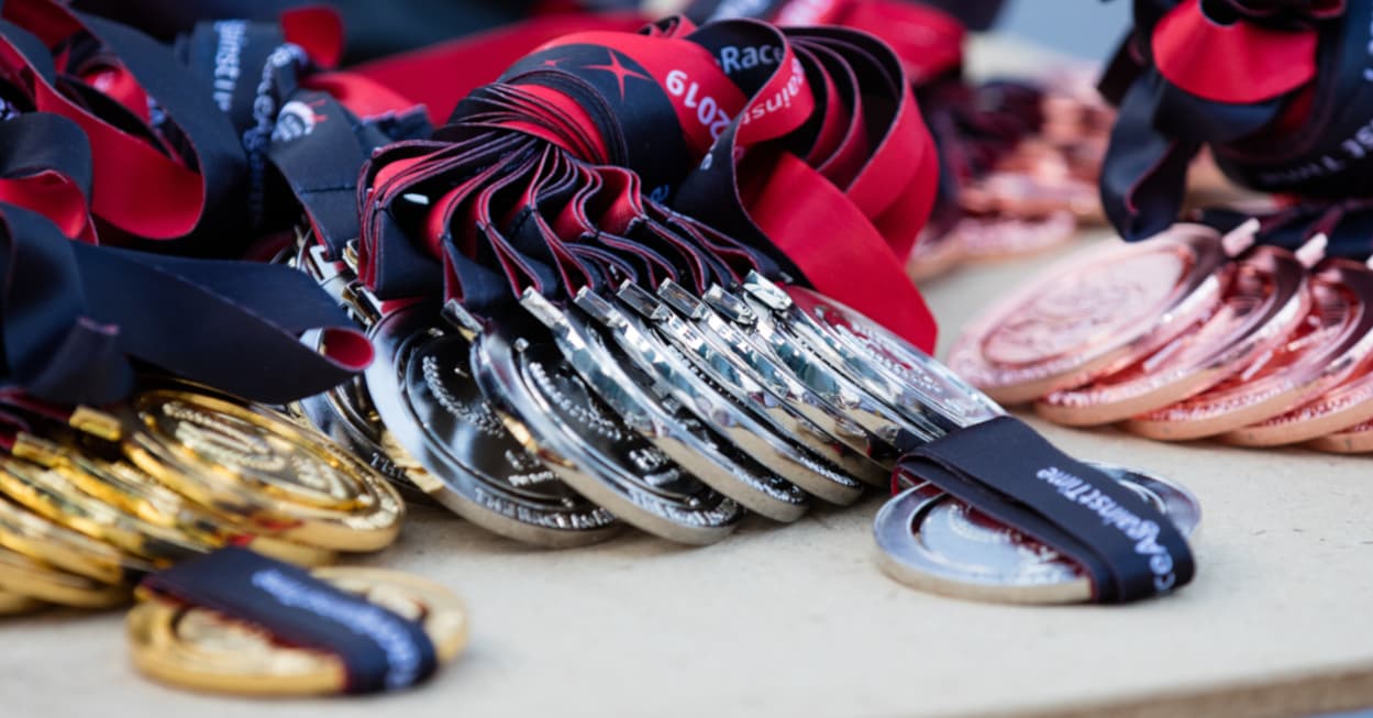 Dragon boat medals and trophies won by German Dragons Singapore team members